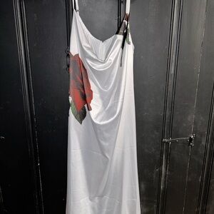 Elegant White Dress with Red Floral Design